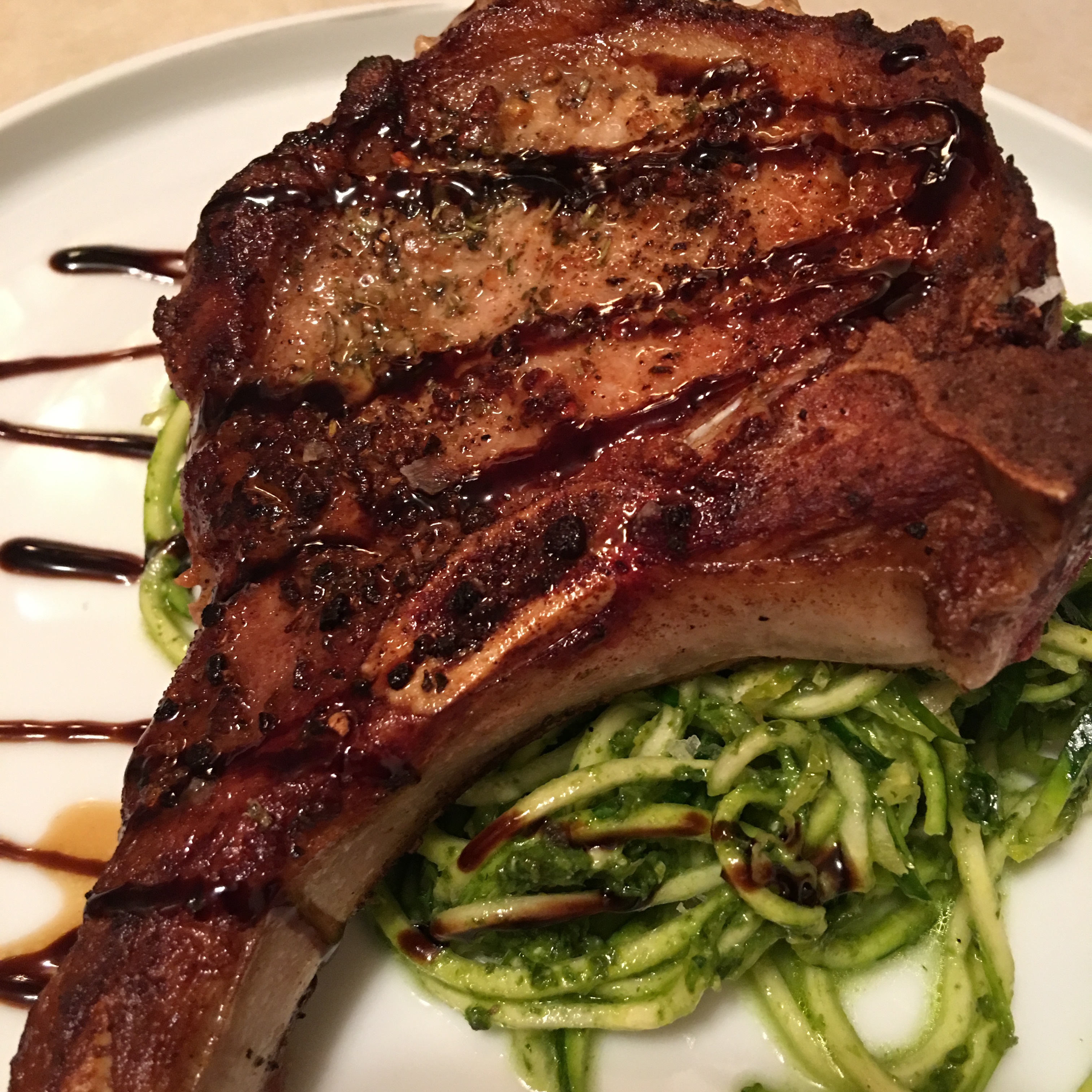 Seared Pork Chop on Pesto Zoodles